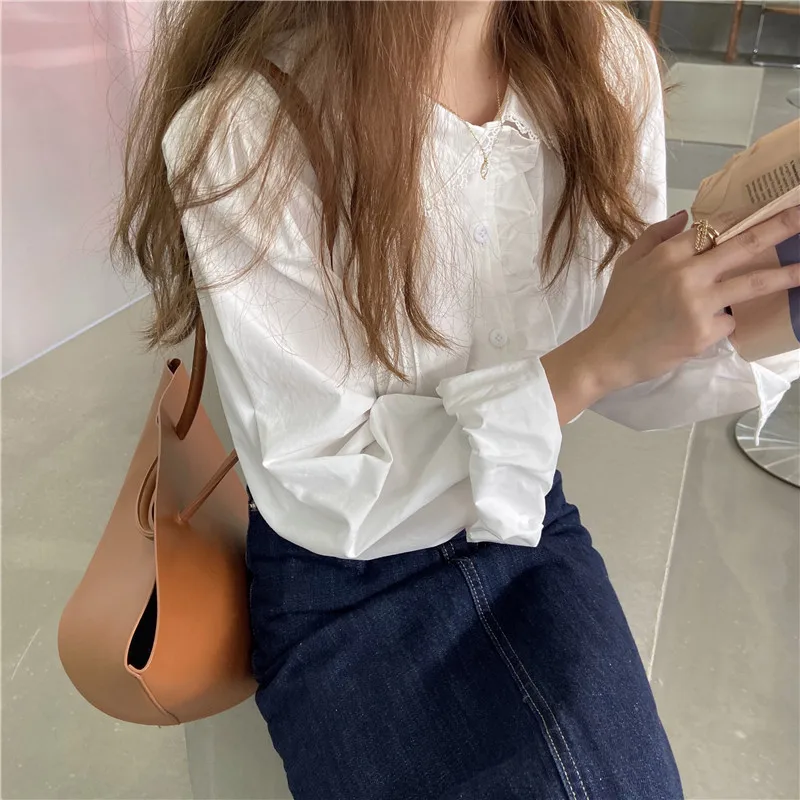 

RUGOD 2021 Korean solid color wild pleated shirt with wood ears