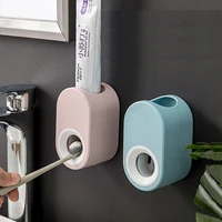 plastic wall mounted toothbrush holder automatic toothpaste dispenser toothbrush storage for toilet bathroom accessories