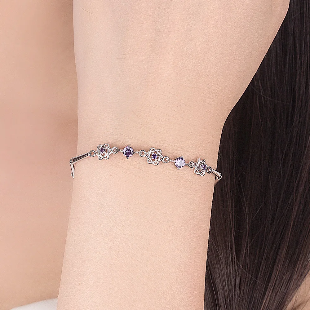 Браслет из серебра пробы с фиолетовыми и прозрачными звездами Давида браслет для