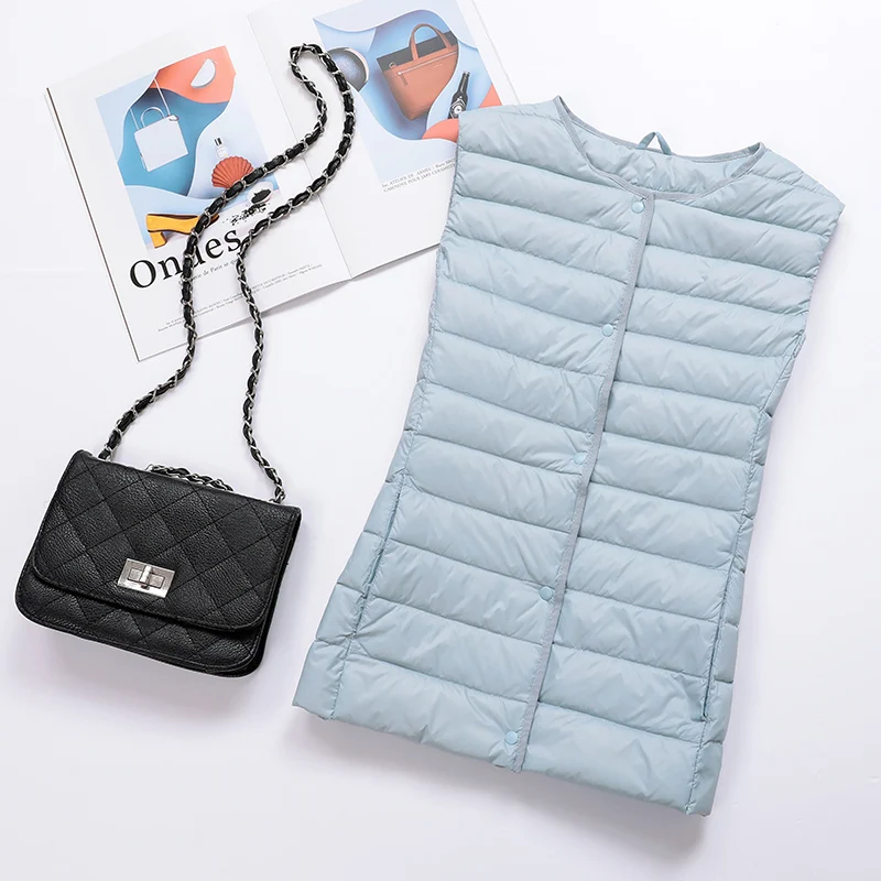 Жилет-пуховик женский ульсветильник пуховик без рукавов короткий жилет RSMJ1001 KJ4092