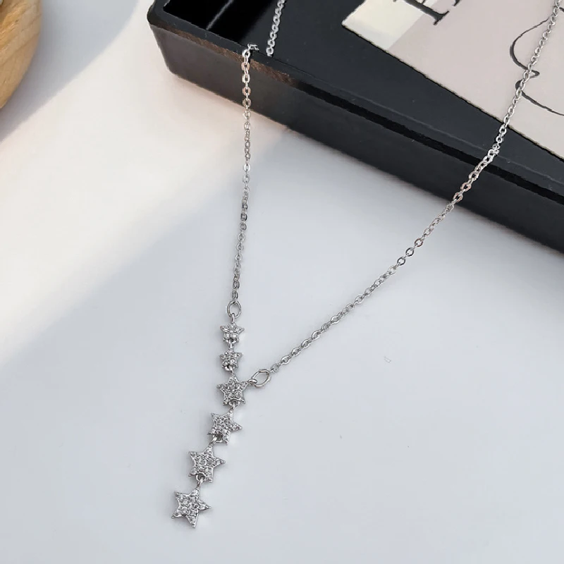 

European and American new copper micro inlaid zircon Star Pendant Necklace tassel female student minority design sense six star