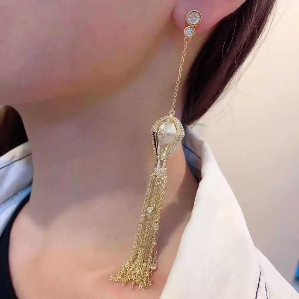 

Модные женские серьги из серебра 925 пробы с цирконом и бахромой