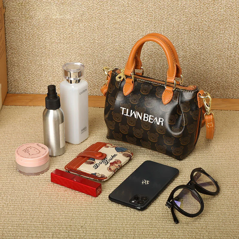 

Handbag women messenger small square bag temperament simple and versatile temperament one-shoulder large-capacity commuter bag