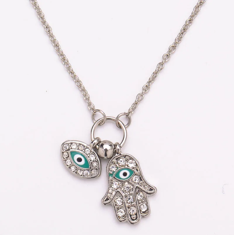 

Hot sale alloy drip oil hand of Fatima necklace Turkey blue eyes diamond jewelry sweater chain