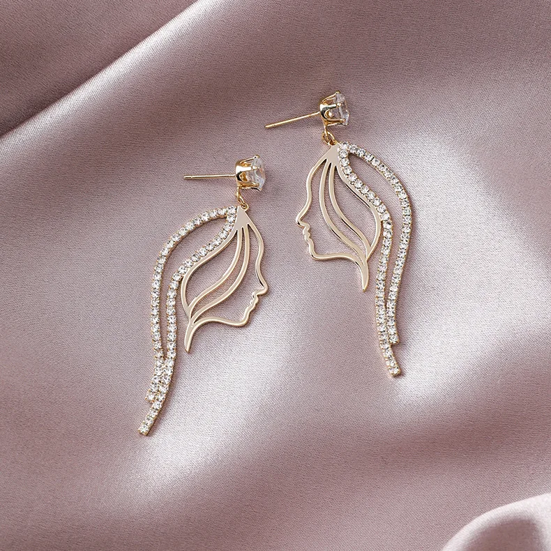 

Elegant Hollow Line Face Earrings Exaggerated Fashion Symmetrical Abstract beauty Girls Earrings Accessories Oorbellen