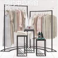 clothing store nakajima display stand for men and women in the middle of the curved hanger simple booth high and low combination
