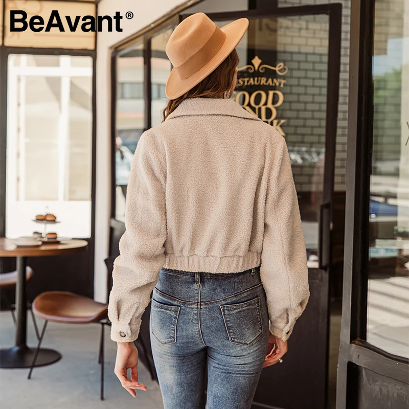 

BeAvant Casual solid button hairy women fur coat Turndown collar pocket short coat Classic warm winter ladies outerwear coat