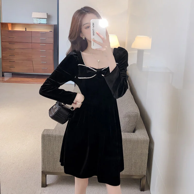 

Женское облегающее платье с бантом на осень и зиму