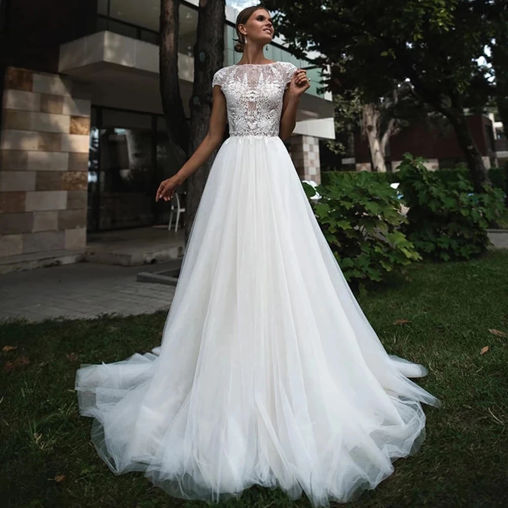 

Sexy Lace A Line Wedding Dresses O Neck Cap Shoulder Button Cut Out Appliqued 2021 New Top Quality Custom Made