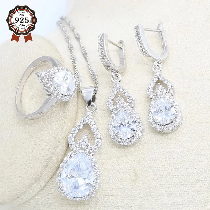 Комплект из кольца и сережек с цирконом серебристого цвета | Украшения