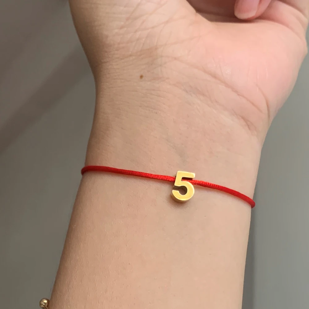 

Simple Stainless Steel Gold Color Lucky Number 57 Bracelet Fashion Handmade Adjustable Red Rope Chain Wristband Arm Cuff Jewelry