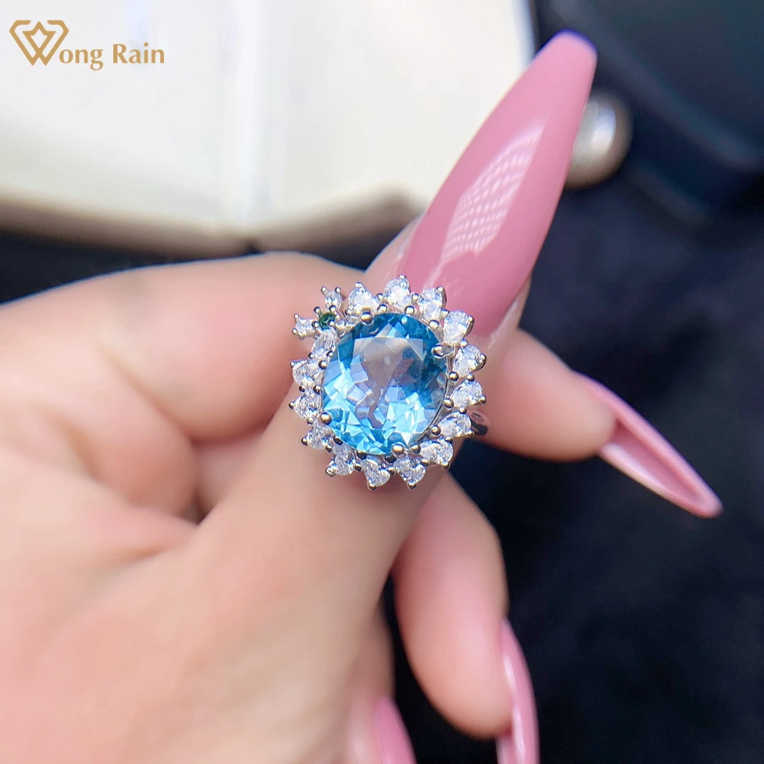 

Wong Rain романтическое 925 пробы Серебряное овальное огранка 10*12 мм натуральный голубой топаз Драгоценный Камень Обручальное женское кольцо хо...