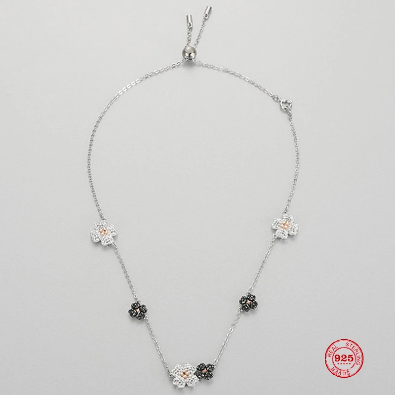

Женское ожерелье из серебра 925 пробы с маленькими черно-белыми цветами