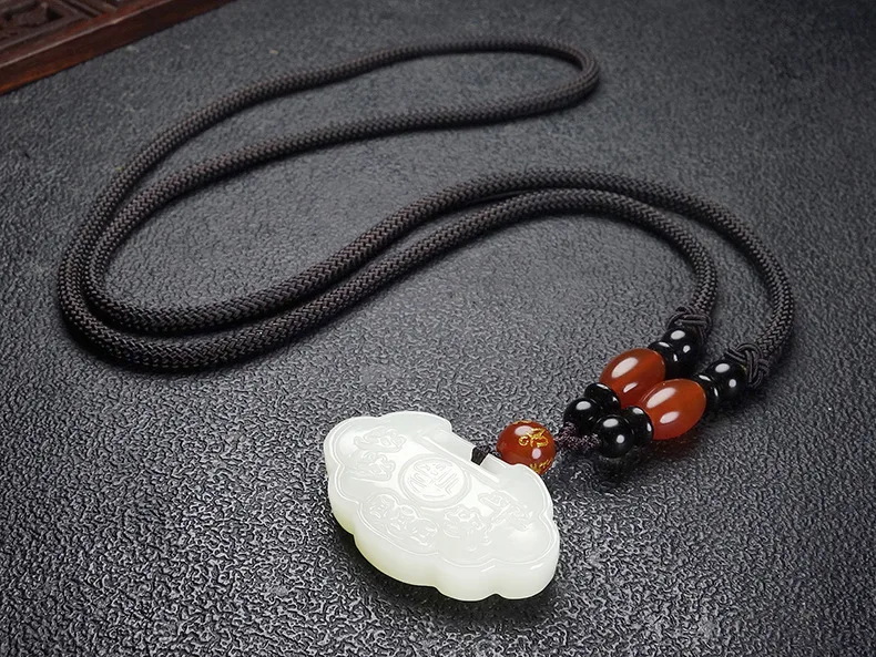 

Wholesale Hand Carved Xinjiang Hetian Jade Baby Lock Jewelry Pendant Children's "Happy New Year" Pendant Necklace