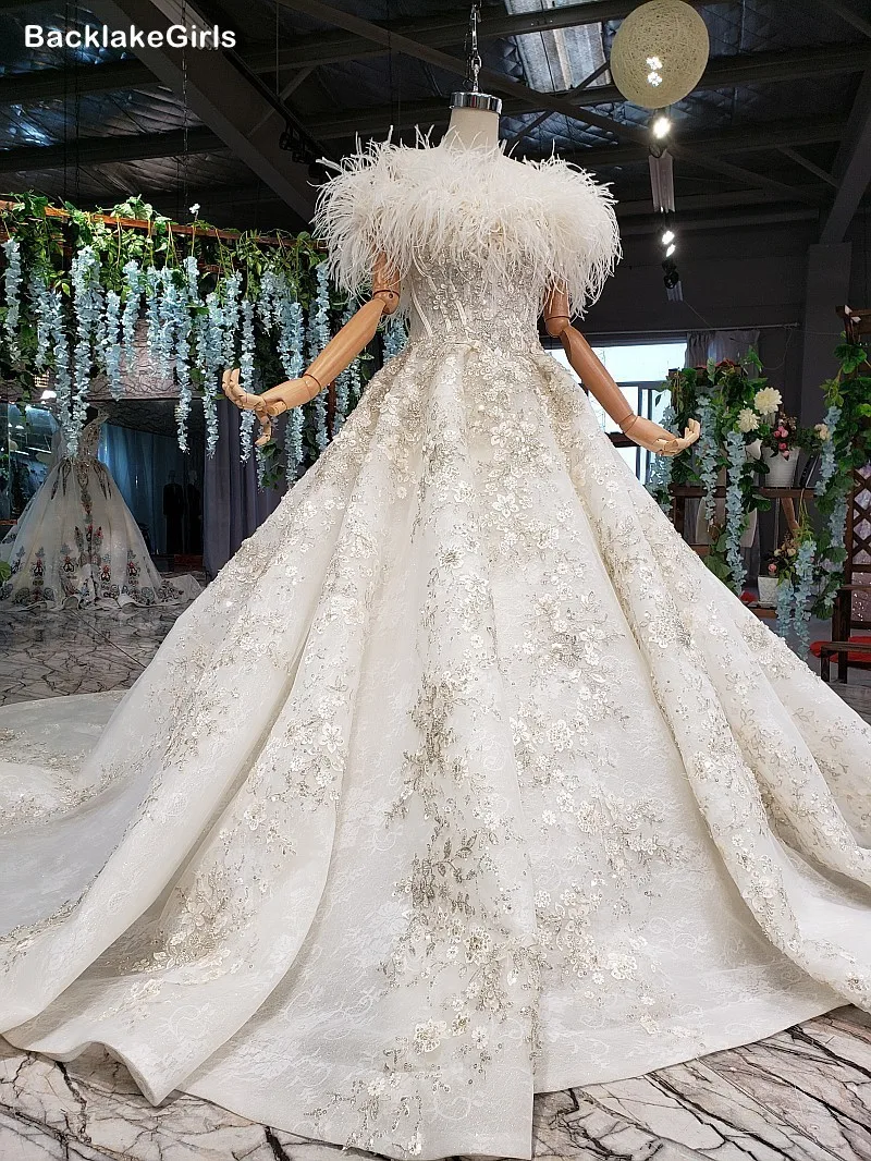 Высококачественные свадебные платья с перьями 2020 Новая мода Сексуальная Лодка