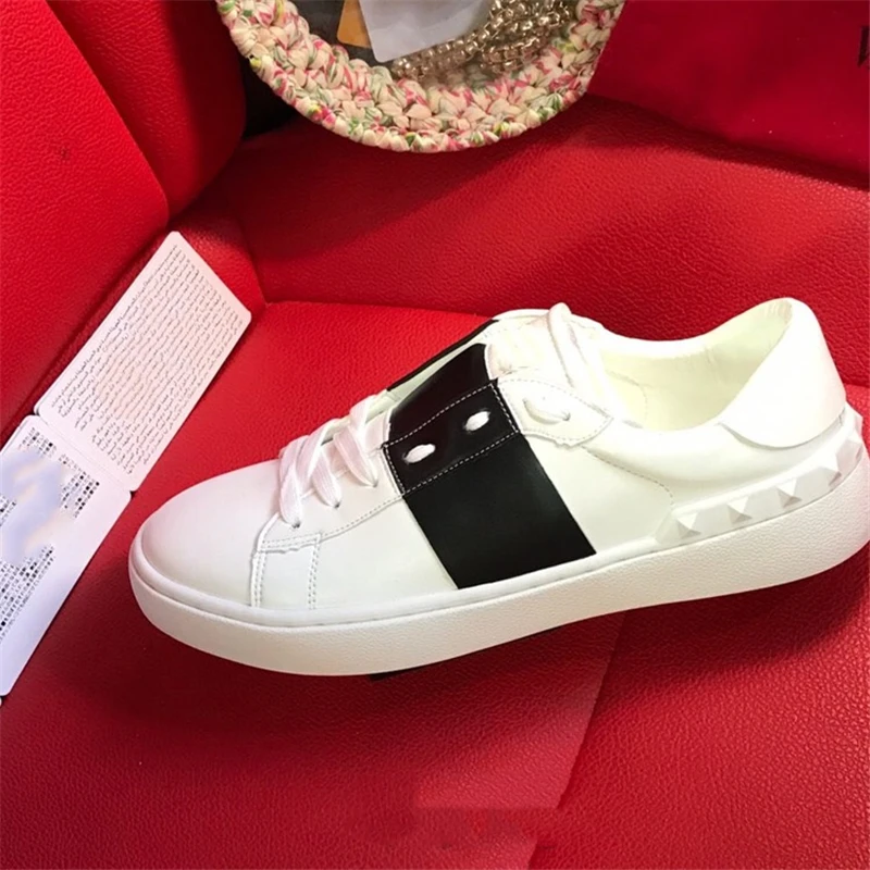 

Женские и мужские повседневные кроссовки для бега с заклепками, кожаная спортивная обувь на плоской подошве для пар, унисекс обувь для ходь...