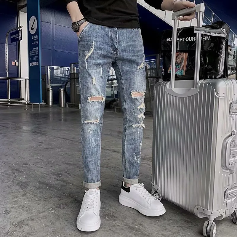 

2021 2021 Fashion ripped elastic summer Denim jeans male beggar raw edge personality trend light casual pencil pants