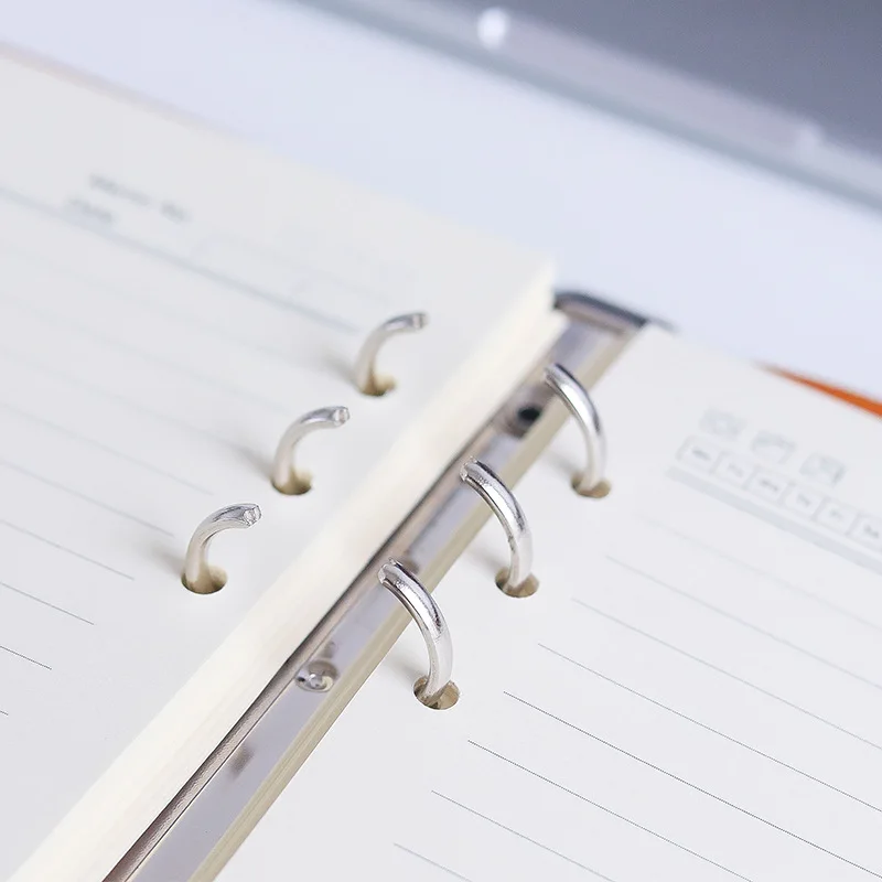 Блокнот деловой А5 с 6 отверстиями и лазерным логотипом на заказ 100 листов 1