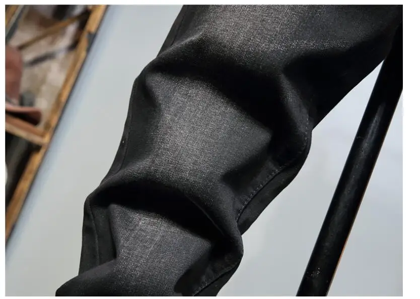 Men's micro-stretch jeans trousers original design New european american embroidered cross medal small straight trendy Pants