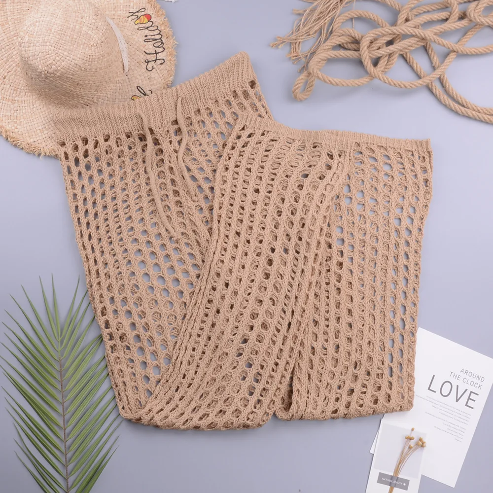 

WILK new summer beach dress pure color knit hook sexy hollow out loose wide-legged pants casual women's woven pants