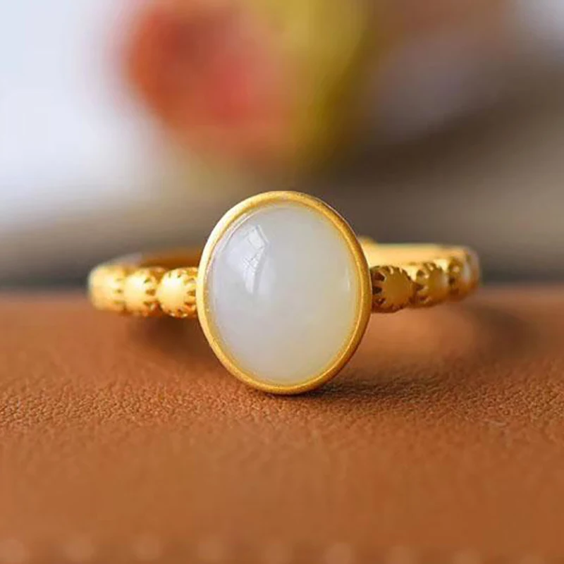 

The new SNewsilver inlaid Hetian jade Cold wind Chinese retro single-sided ring hollow design women's opening adjustable jewelry