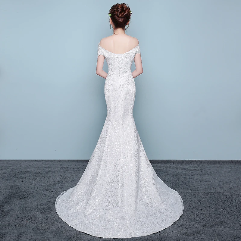 Свадебное платье с юбкой-годе классическое V-образным вырезом открытыми плечами