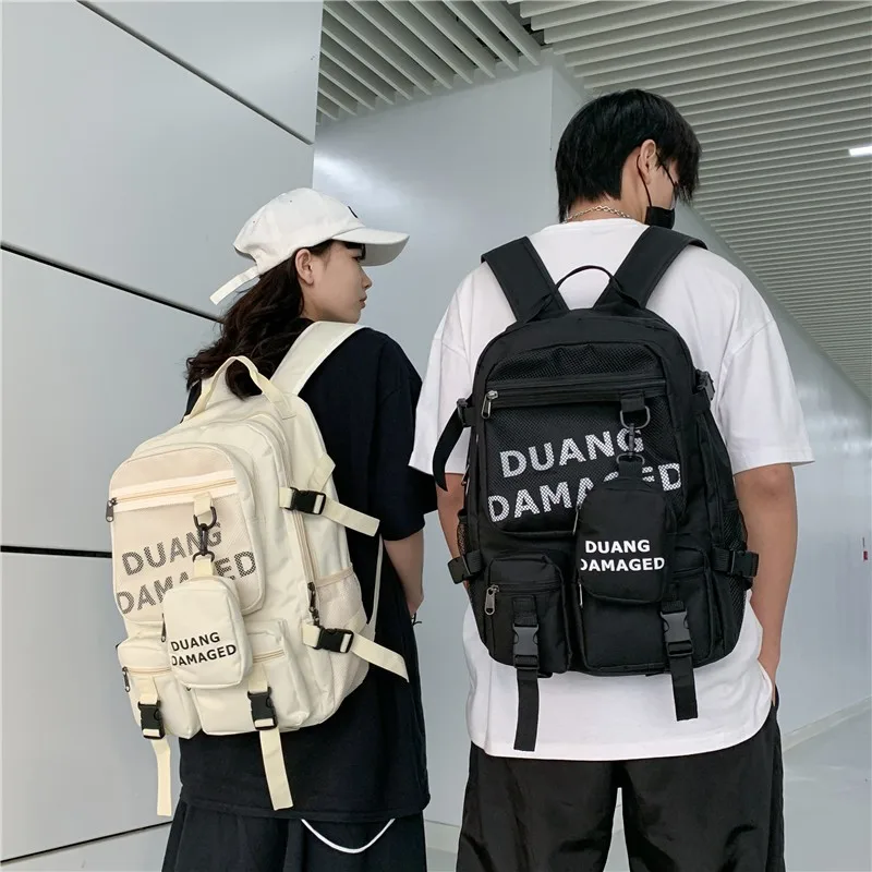 

Модный женский и мужской рюкзак с надписью, школьный ранец, водонепроницаемые студенческие книжные сумки с несколькими карманами, вместите...