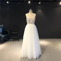 real pictures newest high quality customized ivory tulle v neck sleeveless heavy beadings a line floor length wedding dresses