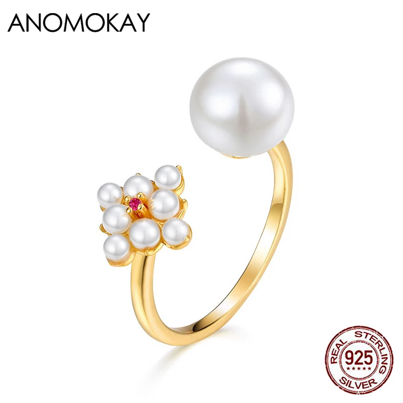 

Кольцо женское из серебра 925 пробы с цирконом и жемчугом