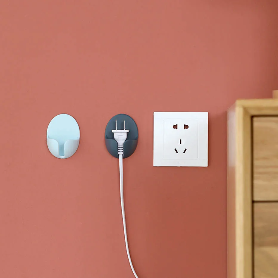 

2Pcs/lot Nail-free Power Cord Storage Rack Wall Storage Hooks Kitchen Plug Hook Adhesive Hooks Power Plug Socket Hanger Holder