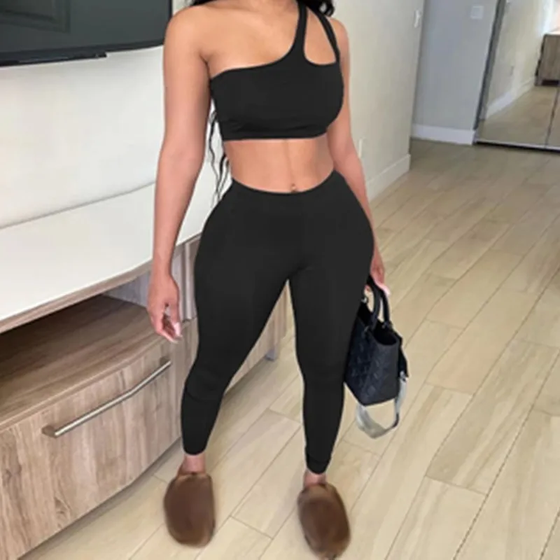 

2021 Sexy Two Piece Set Club Outfits One Shoulder Hollow Crop Top Sweat Pants Set Women Summer Clothes Tracksuit Matching Set