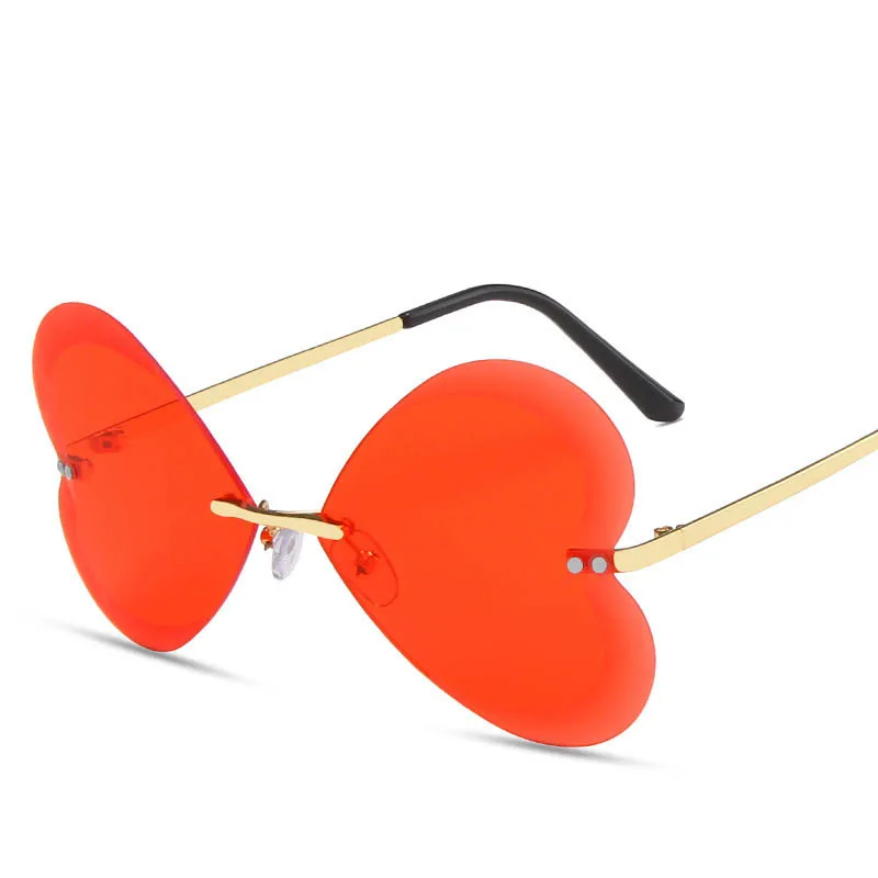

Brand New Rimless Women Sunglasses Fashion Female Heart Shaped Metal Frames Sun Glasses Vintage Butterfly Eyewear UV400