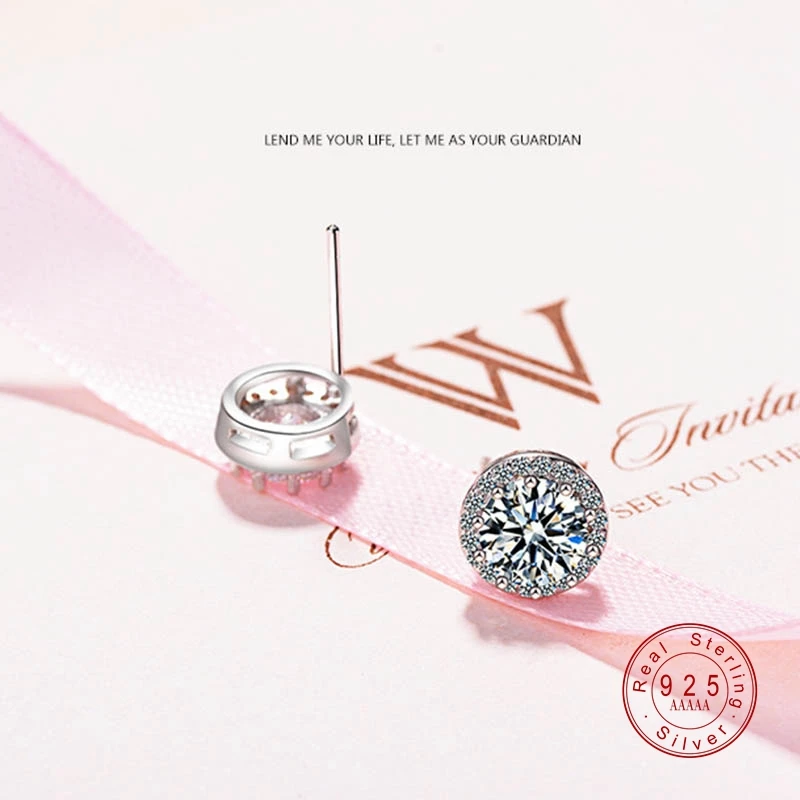 Женские серьги гвоздики серебряного цвета с круглыми кристаллами и фианитом