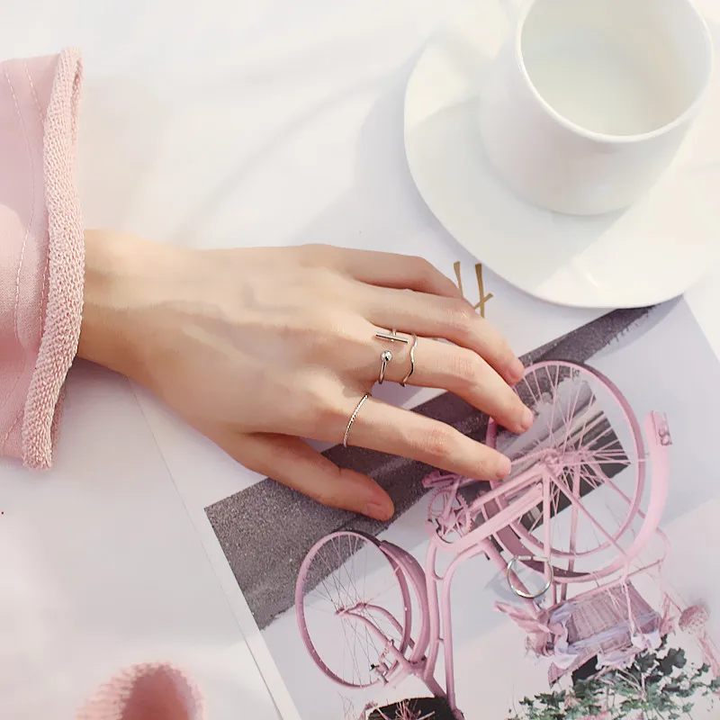 

Simple and fashionable copper metal plating triangle geometric four-piece open ring set 18030072