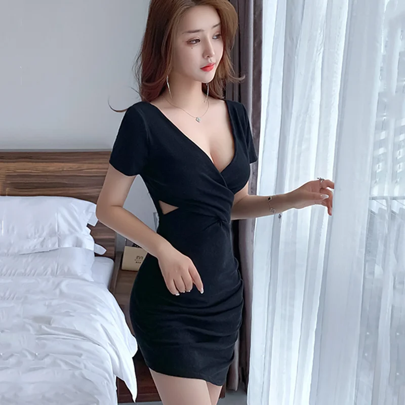 

New sexy nightclub low-cut low-waist hollow cross-slim-fit hip asymmetrical dress