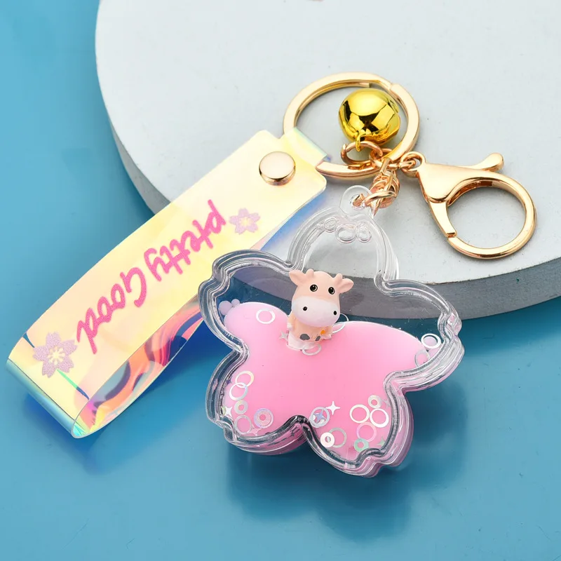 

New Acrylic Oiled Cow Cherry Blossom Keychain Cute Doll Calf Net Red Packet Ornament Small Jewelry