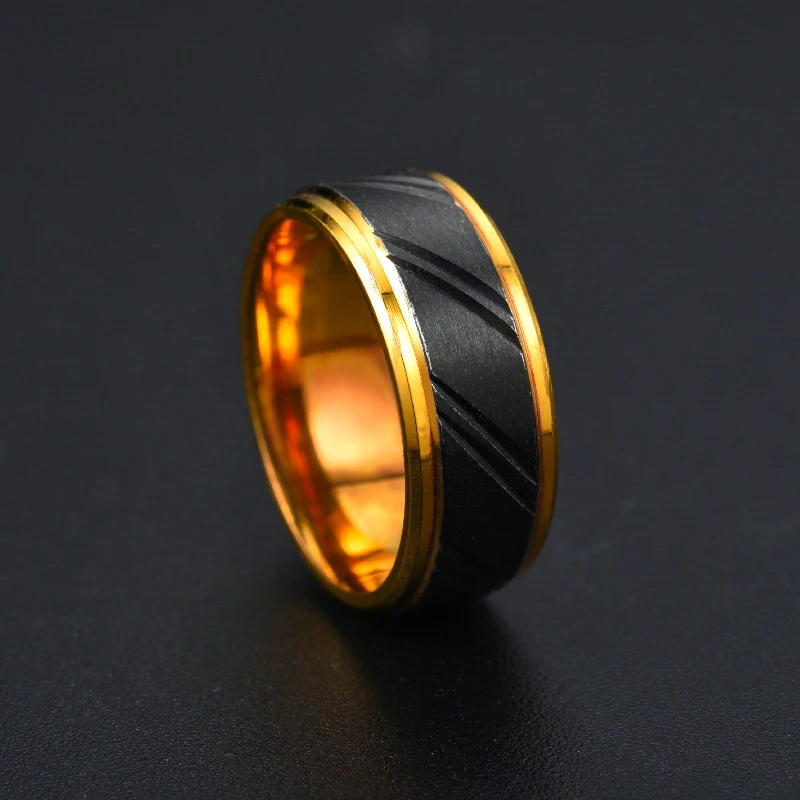 

Popular 8mm Tungsten Carbide Steel noble black Athena gold ring. The charm of men. Fashion trend engagement accessories.