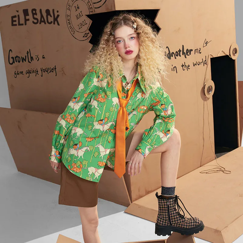 

ELFSACK Graphic Print Chic Single Breasted Casual Shirt Women,2021 Winter Vintage,Korean Ladies Daily Top