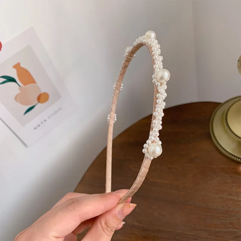 

2021 new sweet, elegant and simple wild pearl thin hair band press hair card Sen female wild net infrared out headdress