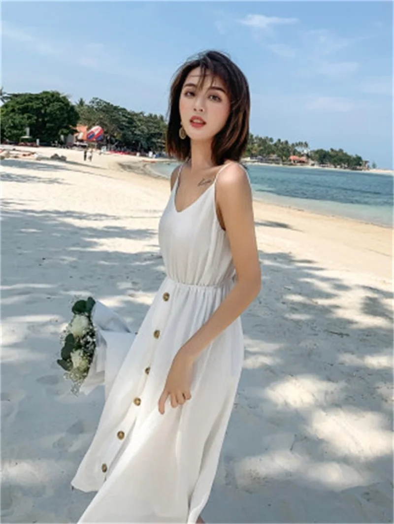 

2021 new beach skirt V-neck open back white dress