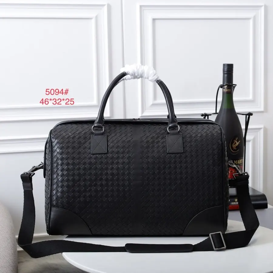 

Leather woven hand-held travel bag large capacity business trip single shoulder diagonal span boarding bag