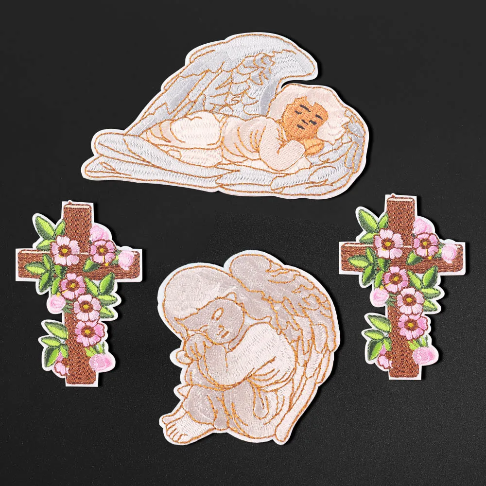

White angel wings, computer embroidery, cross, flowers, embroidered chapters, decorated with holes in clothes, ironed with iron