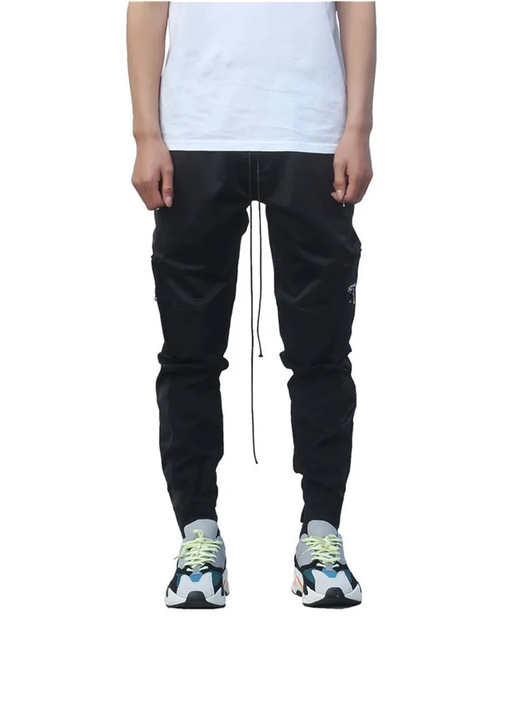 

New style trends brand men loose sweatpants Han edition youth ins Harem Pants Beam Foot rope Male zipper pockets trousers