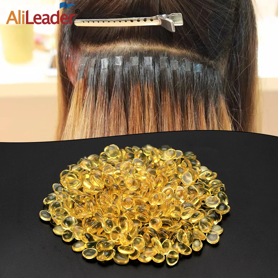 

Alileader Good Quality Itlian Keratin Glue Grain Transparent Yellow Color Keratin Glue Bead For I Tip/U-Tip Extension Human Hair