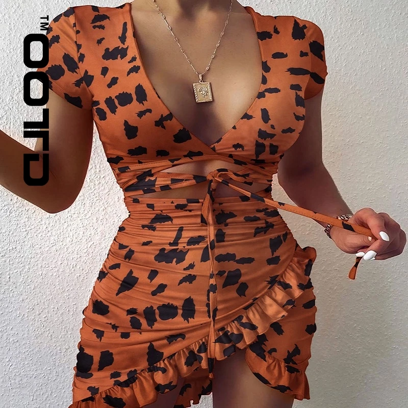 

OOTD Floral Print Fashion Tie Up Wrap Mini Dress 2021 Summer Holiday Ruffles Sundress Ruched Women's Dress Short Sleeve 2021 NEW