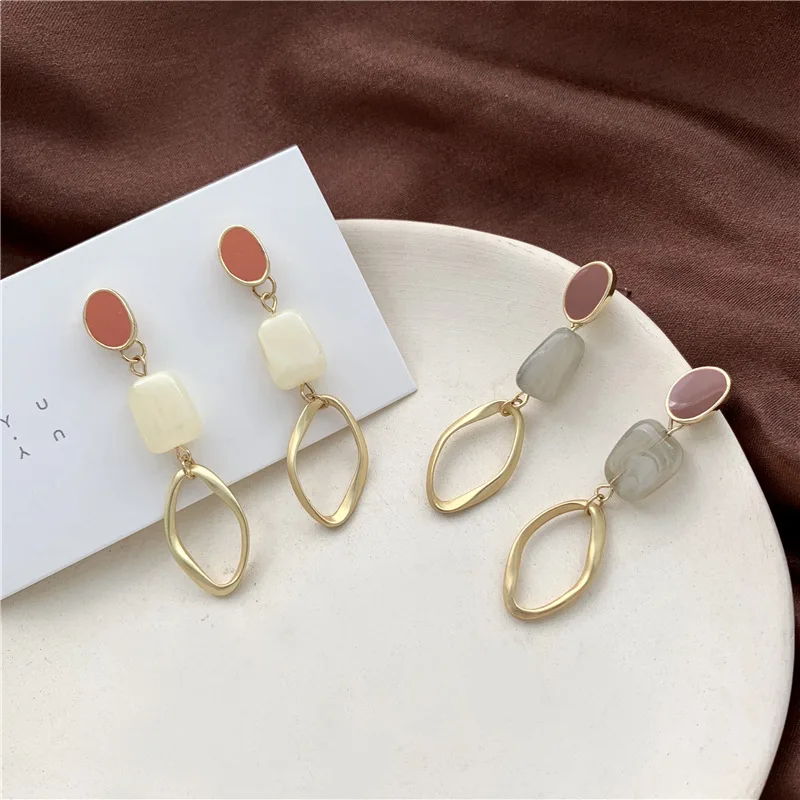 

Retro fashion web celebrity earrings female temperament contracted character texture geometric stud earrings