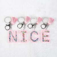 1pc women keychains glitter hollowed out words handbag english letter keyring with tassel charms