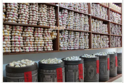 

YU XIANG * Pu-erh Orange 8685 Ripe Shu Cha with Orange Pu-Erh Ripe Tea