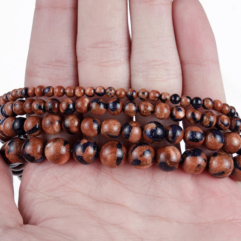 Бусины из натурального камня красные темно-синие мелкого песка для