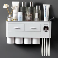 magnetic adsorption inverted toothbrush holder automatic toothpaste dispenser wall hanging waterproof bathroom accessories